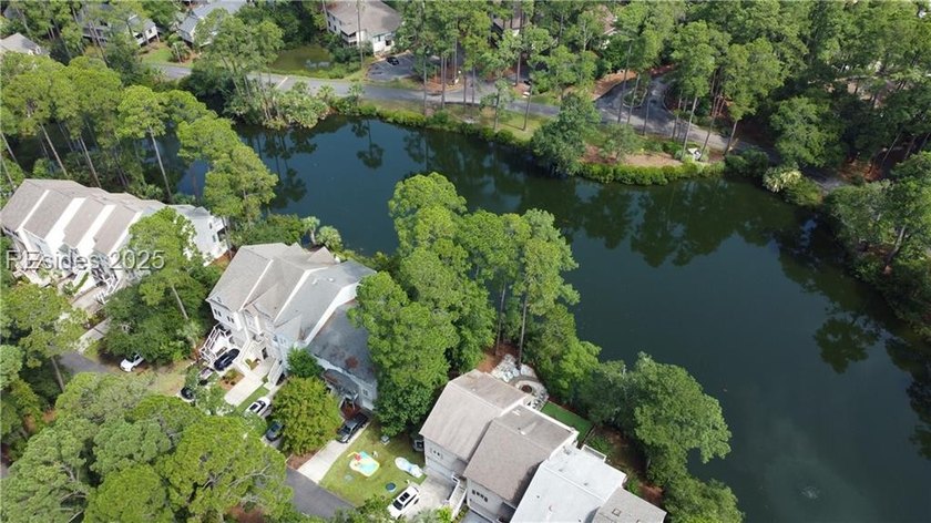 Premium townhome lot with serene lake views in highly desirable - photo 7