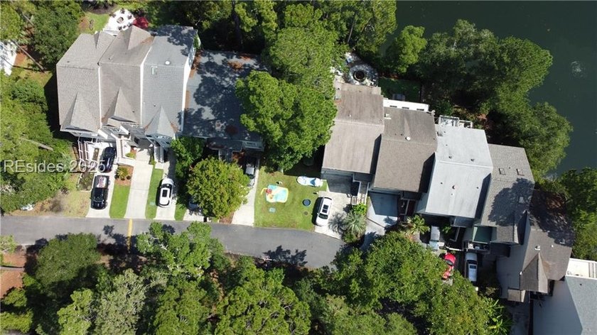 Premium townhome lot with serene lake views in highly desirable - photo 8