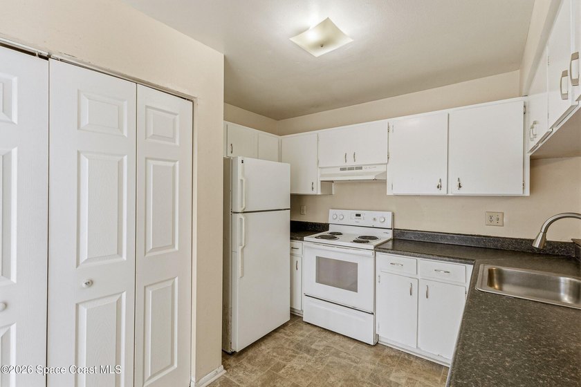 Opportunity awaits in this spacious 3-bed, 2-bath end-unit - photo 11