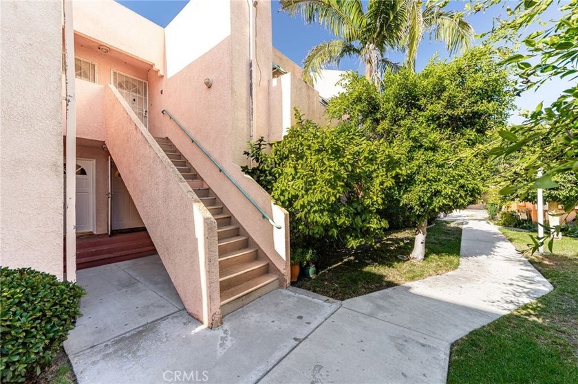 Welcome to this ground-level condominium nestled in the - photo 2