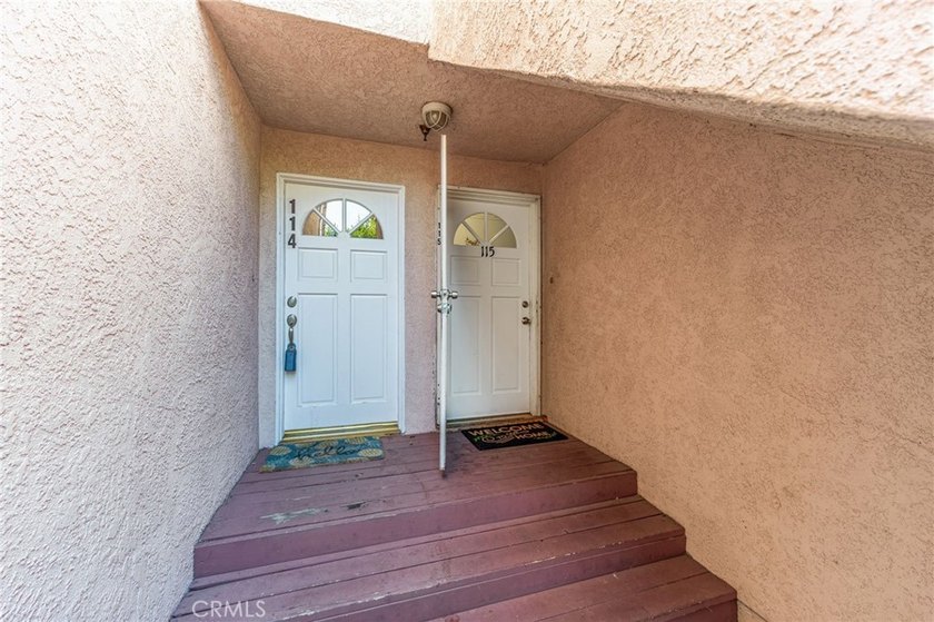 Welcome to this ground-level condominium nestled in the - photo 3