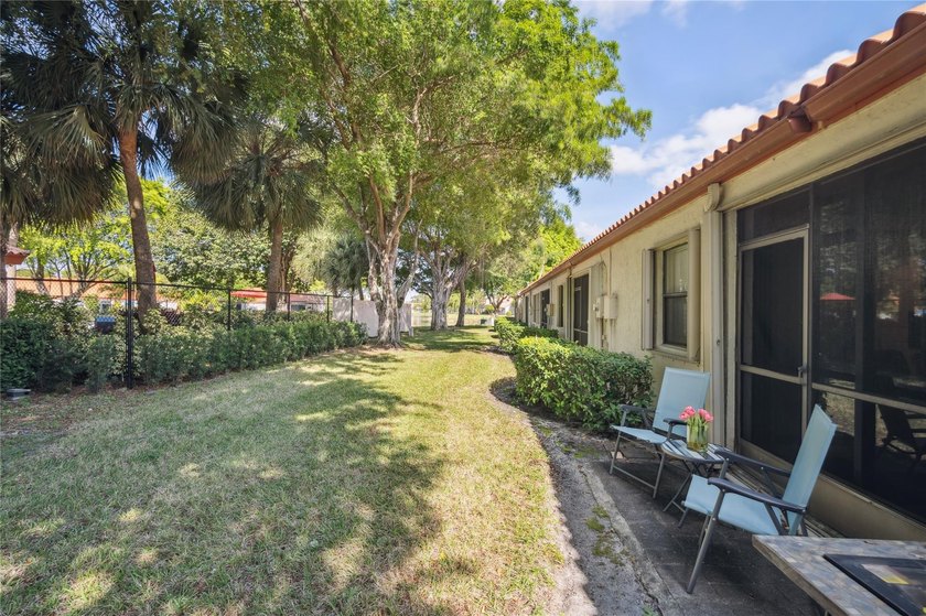 This beautifully updated villa-style home features an open - photo 15
