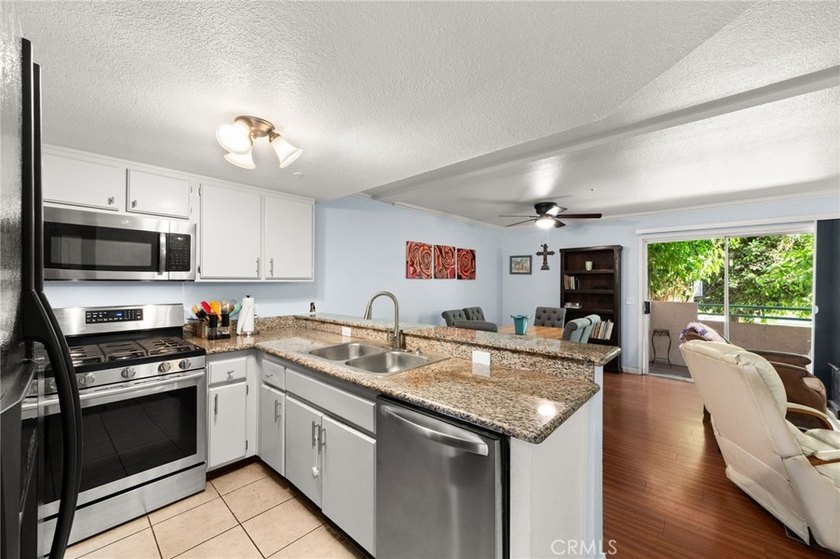 Welcome to this ground-level condominium nestled in the - photo 6