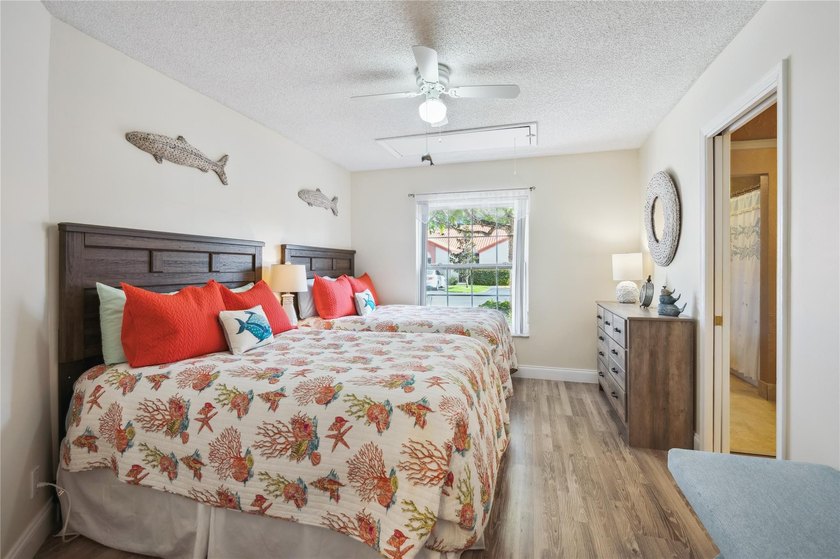 This beautifully updated villa-style home features an open - photo 16