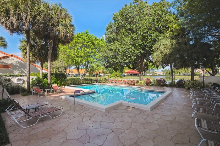 This beautifully updated villa-style home features an open - photo 21