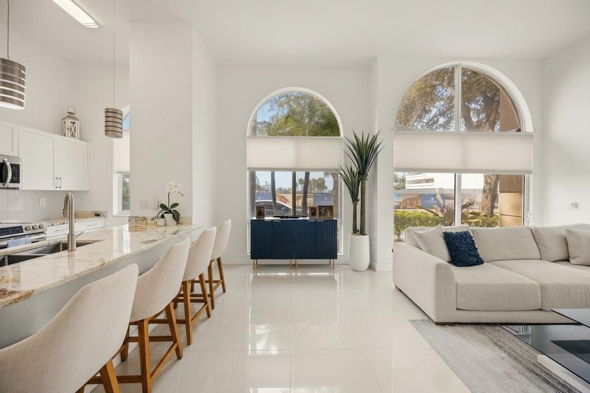 Updated 2BR/2BA corner residence with high ceilings, bright open - photo 5