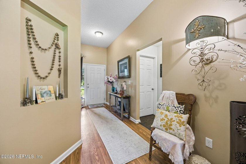 Welcome to this beautiful home located on one acre in the - photo 3