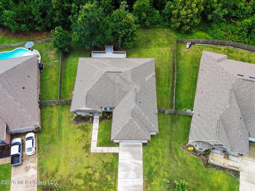 This well-maintained 6-year-old D.R. Horton Parker Plan in the - photo 3
