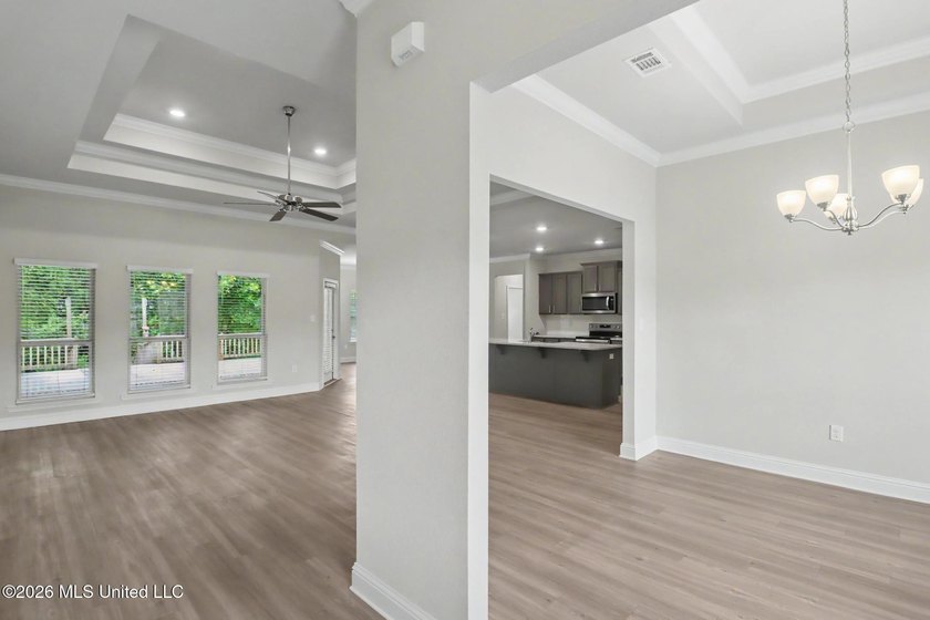 This well-maintained 6-year-old D.R. Horton Parker Plan in the - photo 4