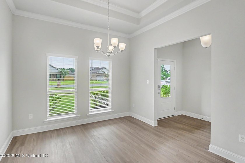 This well-maintained 6-year-old D.R. Horton Parker Plan in the - photo 6