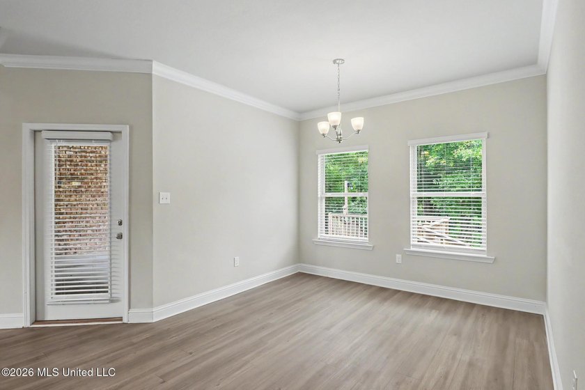 This well-maintained 6-year-old D.R. Horton Parker Plan in the - photo 10