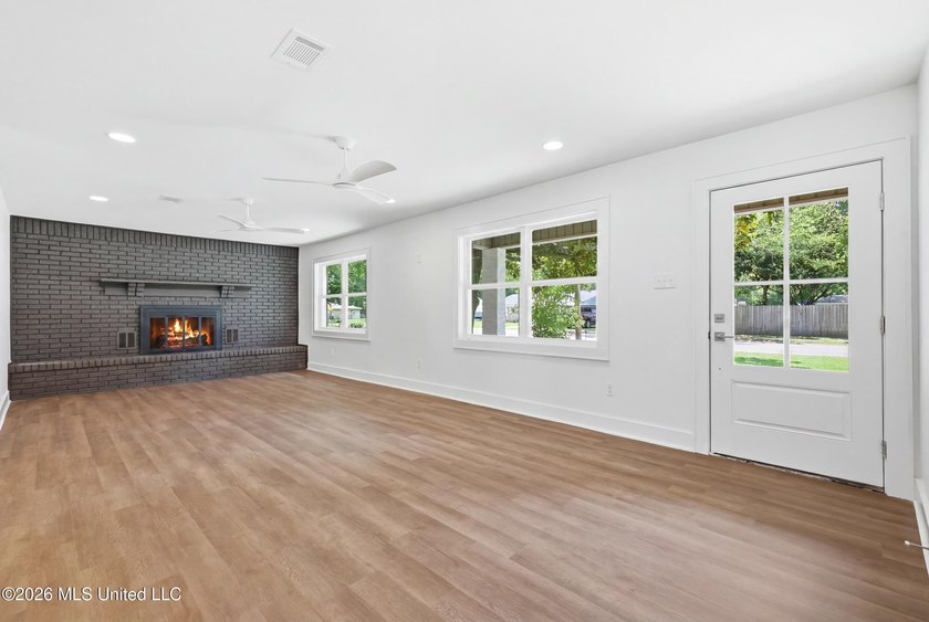 Welcome to your beautifully remodeled home in the highly - photo 2