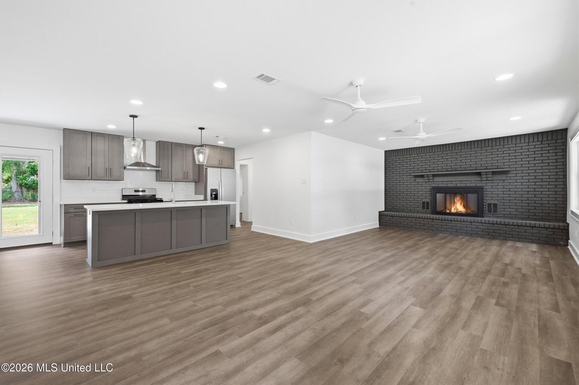 Welcome to your beautifully remodeled home in the highly - photo 4