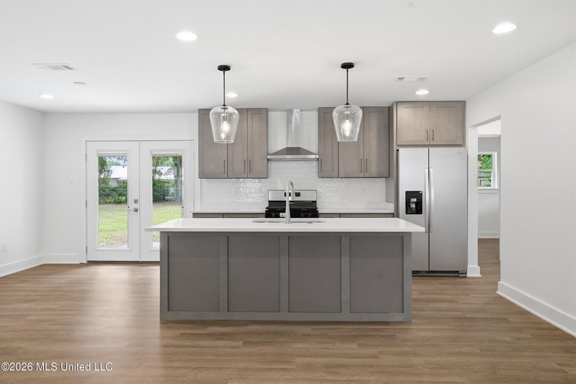 Welcome to your beautifully remodeled home in the highly - photo 7