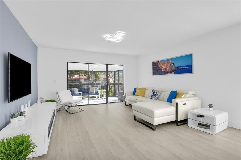FURNISHED LAKEFRONT CORNER UNIT CONDO in the desirable Cypresses - photo 4