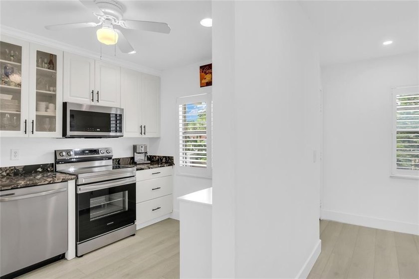 FURNISHED LAKEFRONT CORNER UNIT CONDO in the desirable Cypresses - photo 7
