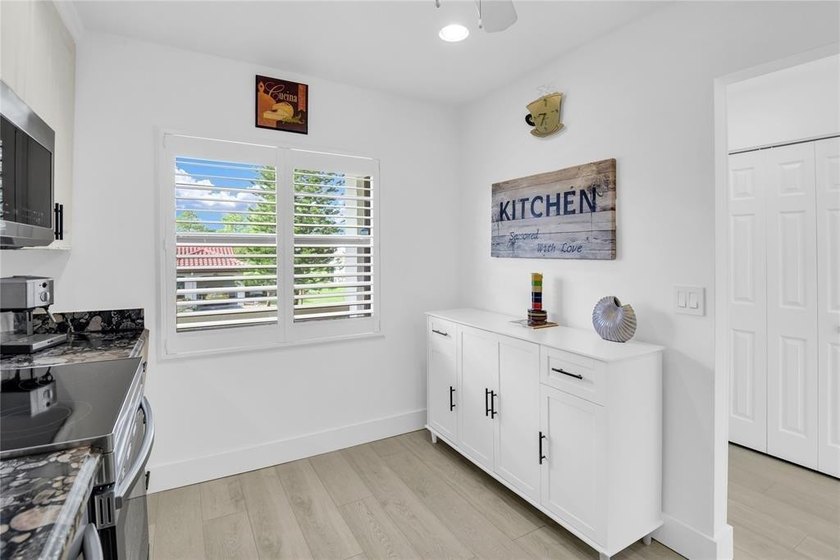 FURNISHED LAKEFRONT CORNER UNIT CONDO in the desirable Cypresses - photo 9