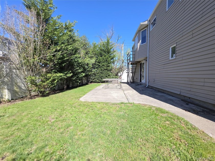 Spacious hi ranch with 4 bedrooms and 3 full bathrooms, set on - photo 18