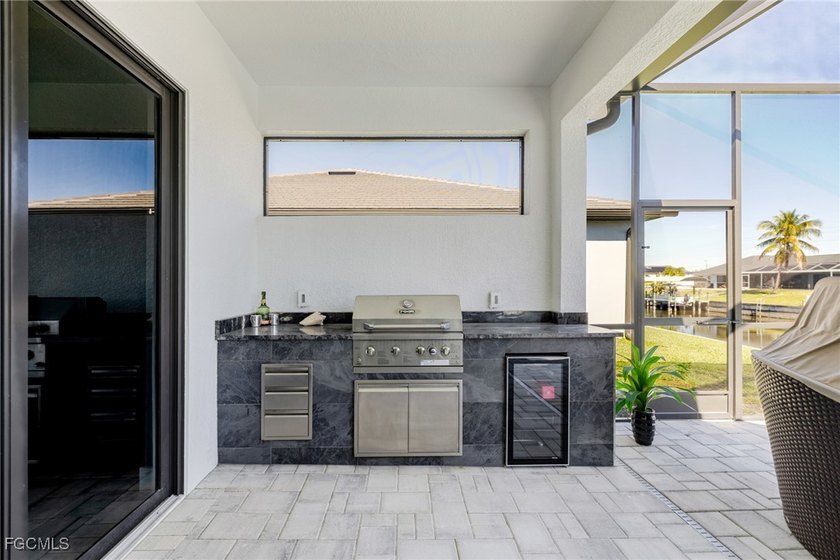 Step into luxury waterfront living with this stunning newly - photo 41