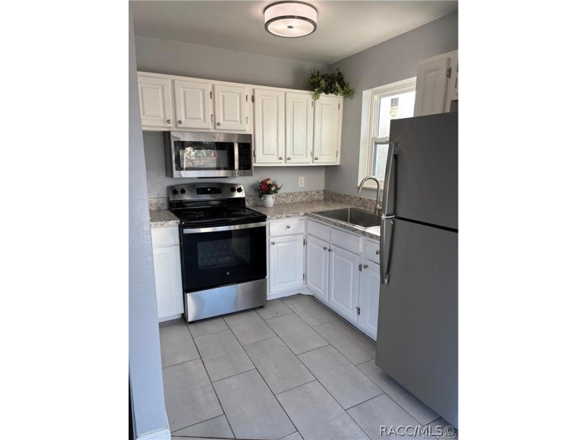 Cute as a button and move-in ready! This charming home is the - photo 9