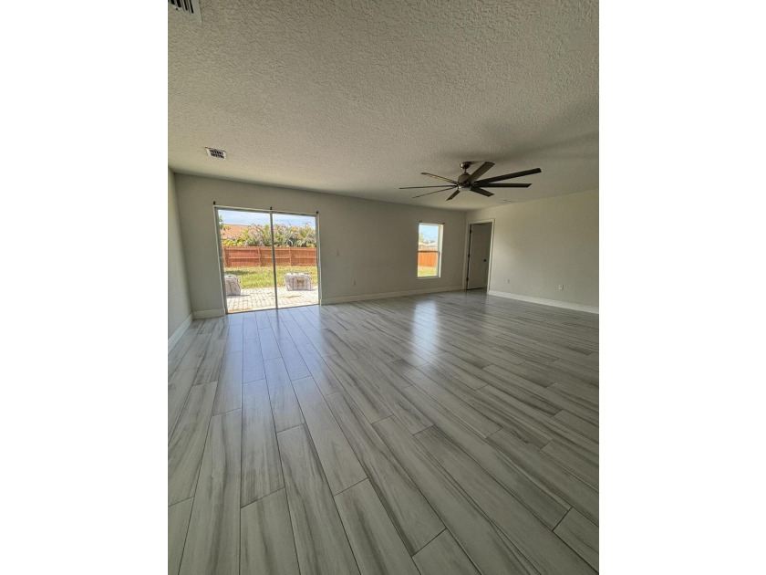 This beautifully updated 4-bedroom home with a den boasts new - photo 2