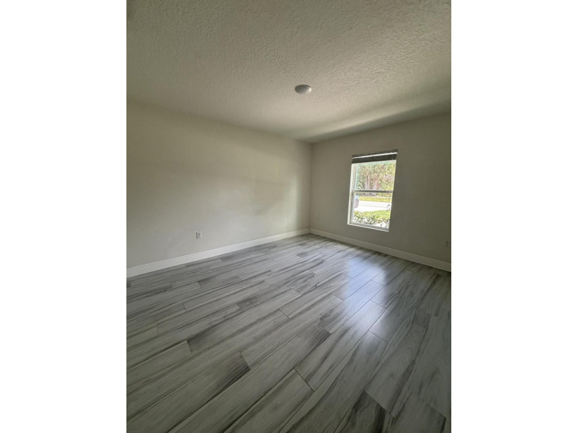This beautifully updated 4-bedroom home with a den boasts new - photo 5