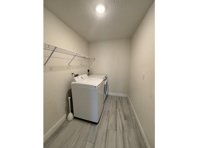 This beautifully updated 4-bedroom home with a den boasts new - photo 10