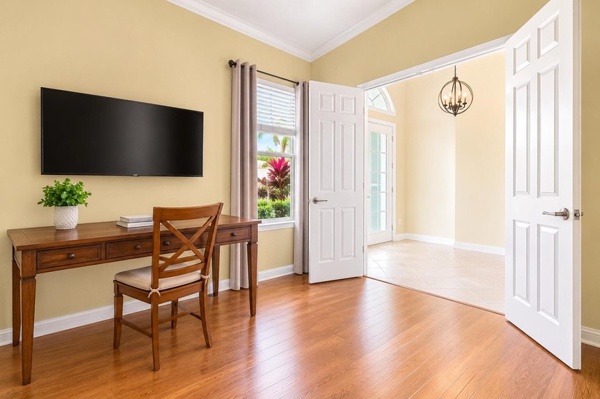 Welcome to this single-story waterfront residence in the - photo 7