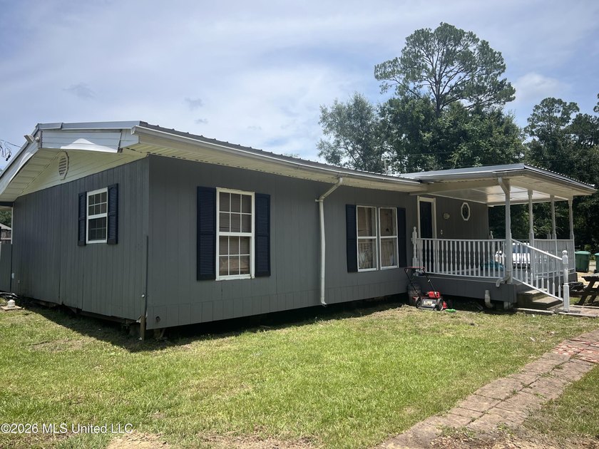 This 3-bedroom, 2-bath home offers 1,056 square feet of living - photo 2