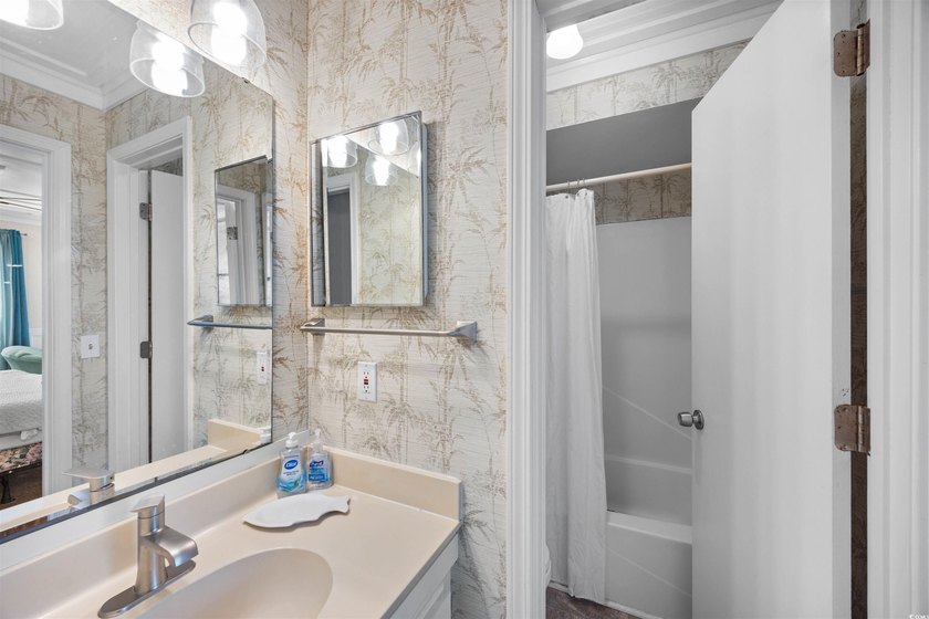 Charming, fully furnished, ocean view condo on Garden City Beach - photo 15