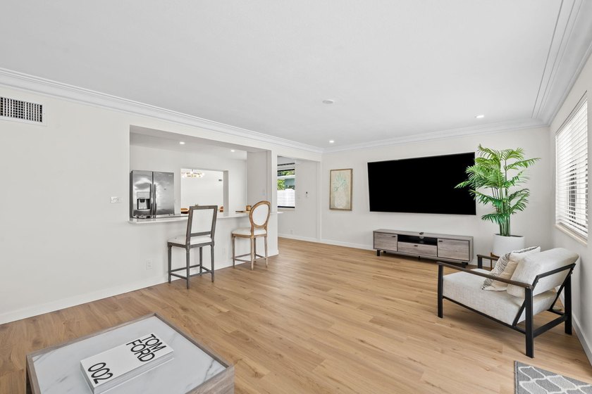 Welcome to this beautifully updated 3-bedroom, 2-bath residence - photo 3