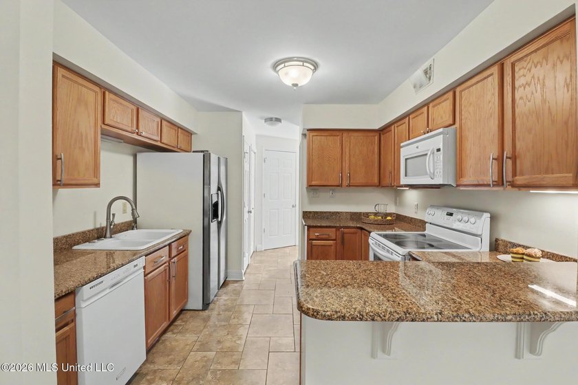 Living at this beautiful 2 bedroom, 3 bath Gulf Oaks Condominium - photo 5