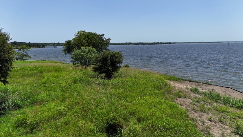 1.16 Acre Lot on Waterfront Peninsula on RC Lake! - photo 26