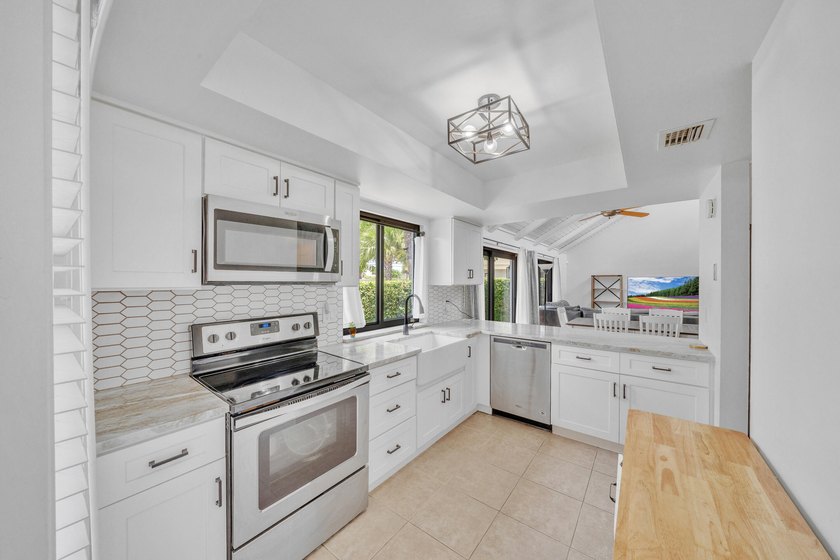 East Boca Villa Now Available for Sale or Lease! Discover the - photo 2