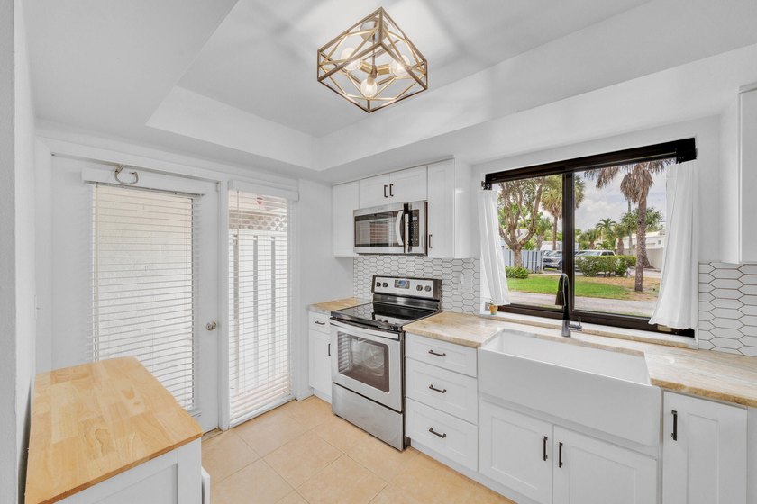 East Boca Villa Now Available for Sale or Lease! Discover the - photo 10