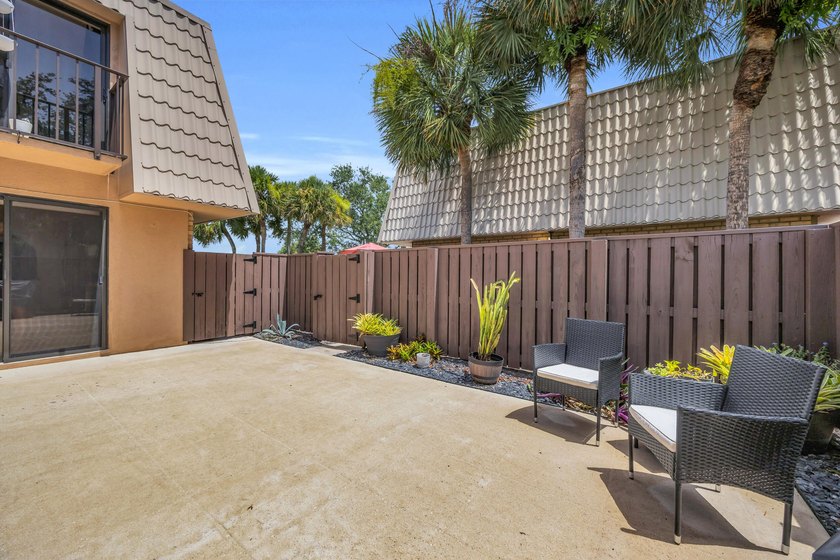 Welcome to this updated townhome in Village of Sandalwood Lakes - photo 3