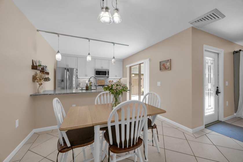Welcome to this updated townhome in Village of Sandalwood Lakes - photo 8