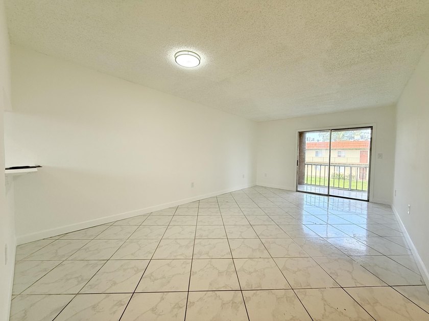 Beautifully renovated 2-bedroom, 1-bath second-floor condo - photo 3