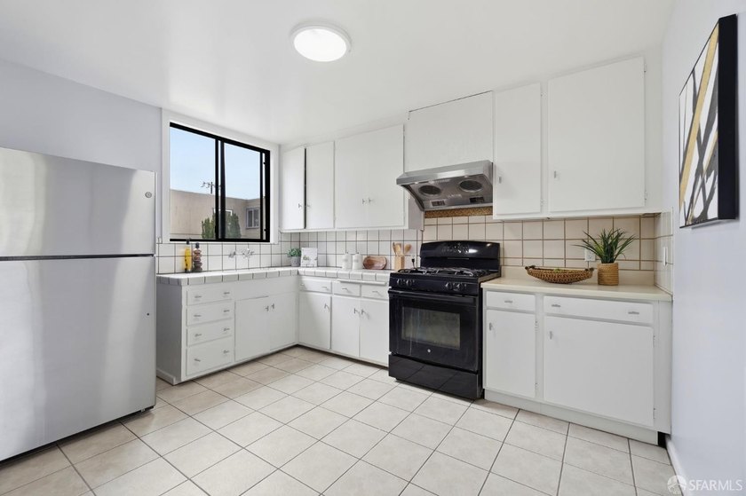 Location, location, location! Welcome to 2180 40th Ave, a bright - photo 13