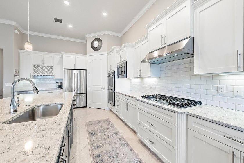 Sitting on the BEST location in the gorgeous, gated community in - photo 15