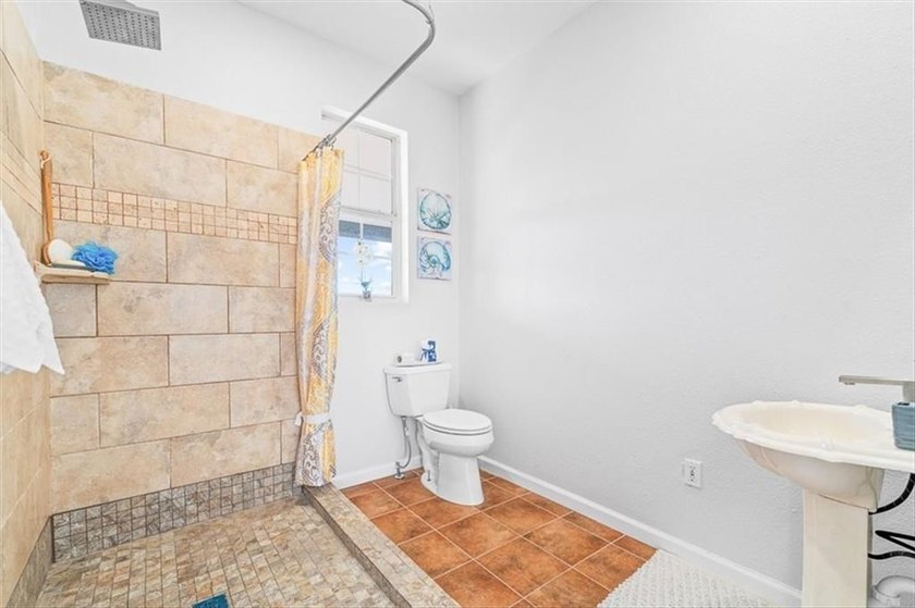 Coastal charm with flexible living space in the desirable - photo 17