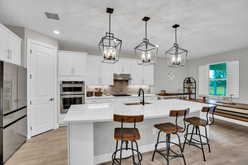 WOW!!! Like new 2022 smart energy-efficient home in Heron - photo 11