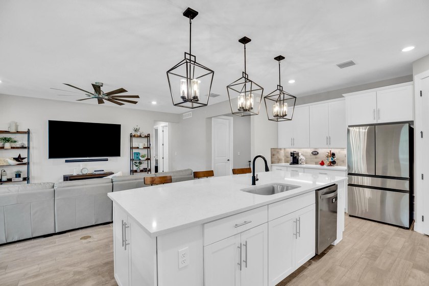 WOW!!! Like new 2022 smart energy-efficient home in Heron - photo 12