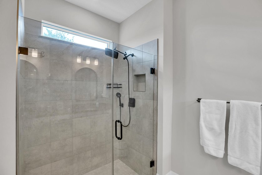 WOW!!! Like new 2022 smart energy-efficient home in Heron - photo 22