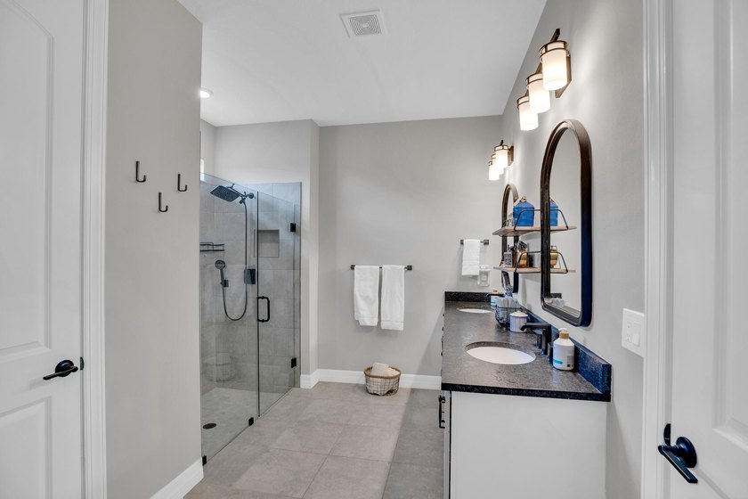 WOW!!! Like new 2022 smart energy-efficient home in Heron - photo 24