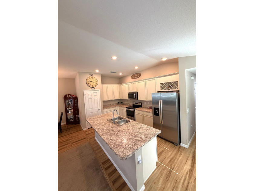 Welcome to this charming 3-bedroom, 2-bathroom home located in - photo 2