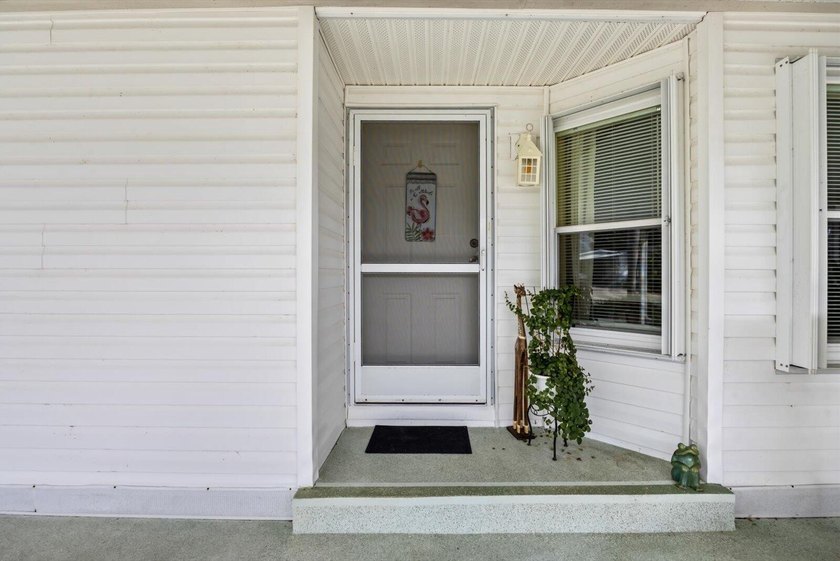 Enjoy lakeside living in this 3-bedroom, 2-bath home located in - photo 3