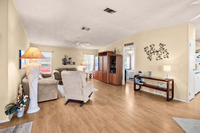 Enjoy lakeside living in this 3-bedroom, 2-bath home located in - photo 5