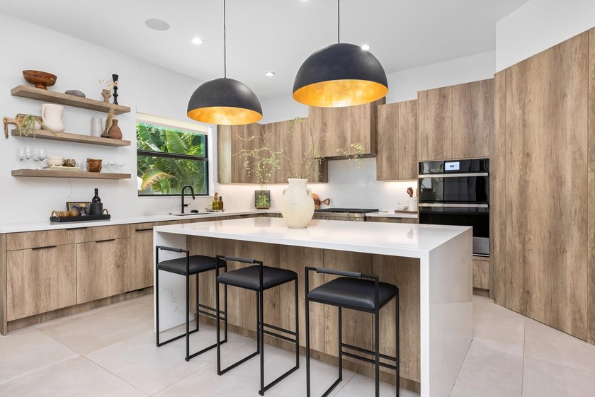 Built in 2022 and perfectly positioned in Boca Villas, this - photo 8