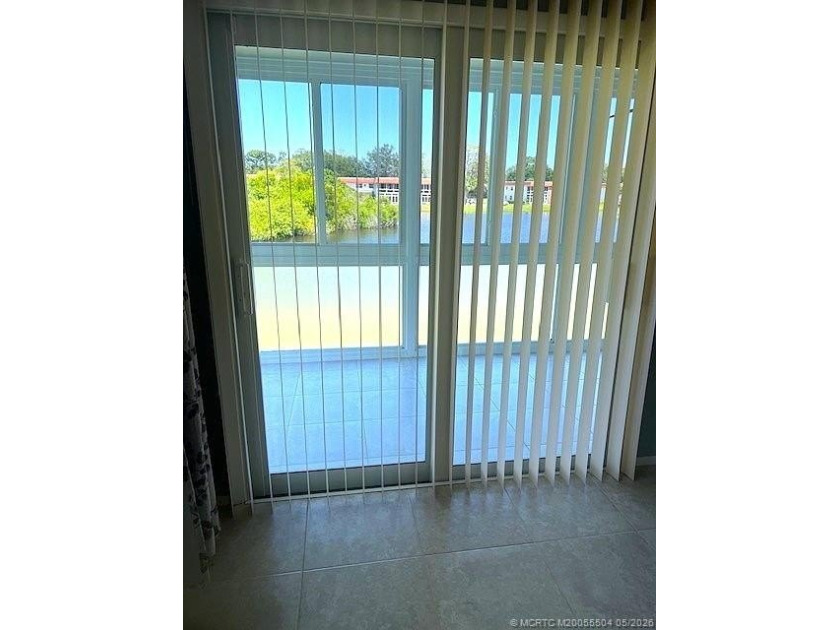 Beautifully tiled 2nd floor 2-bedroom 2-bath unfurnished condo - photo 14